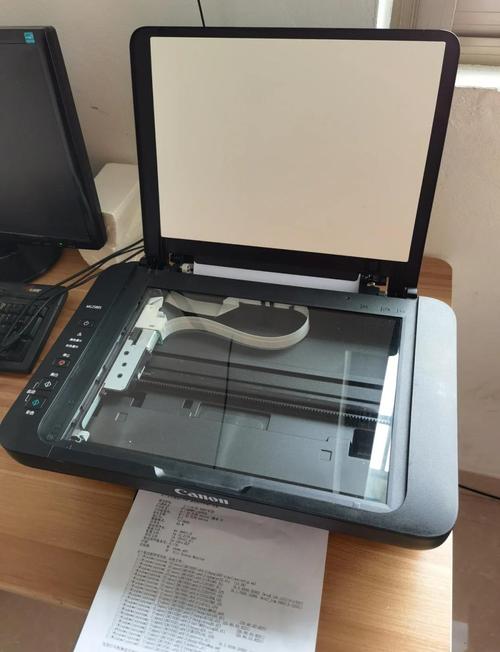 佳能MG2980彩色一体机彩色墨盒灯一直亮,我把墨水全加满了灯还是一直亮...