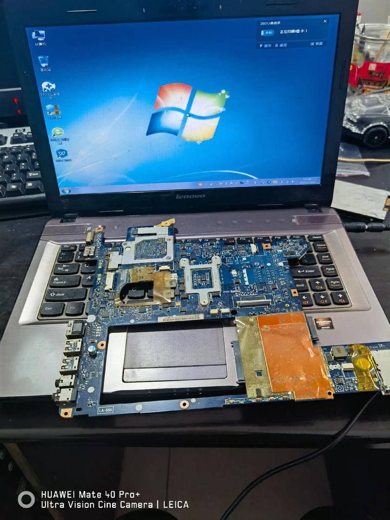 联想y470笔记本插入耳机有电流声怎么办