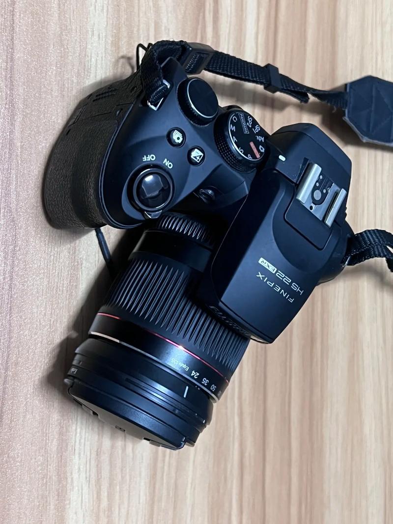 二手尼康D200,05年的,快门换过一次,现在是2W,2500块值吗?