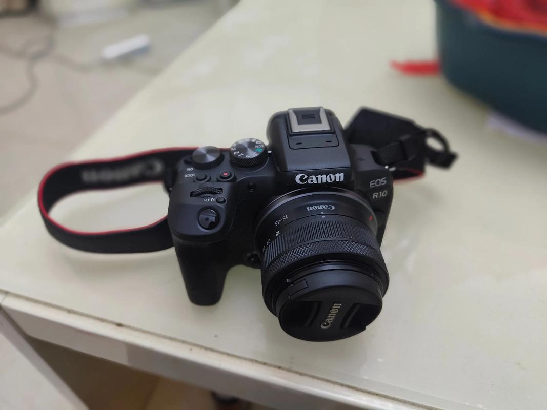 刚买的ixus105为什么很快镜头旁边的105字样就掉了,有人说是水货但是我...