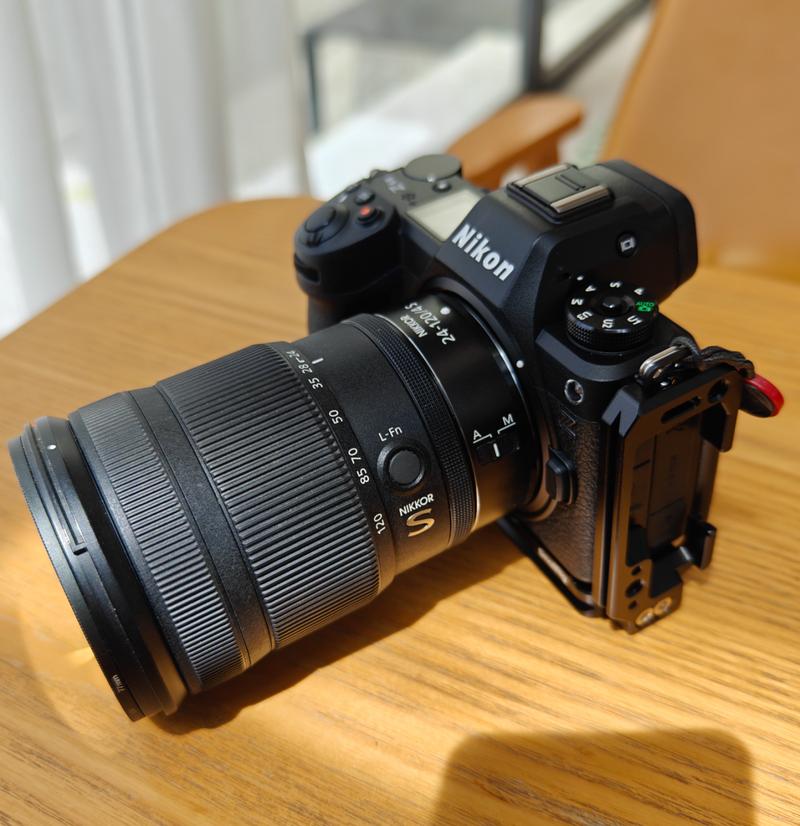 尼康z6第一支镜头?24-70f4还是50定?24-200值得买吗?